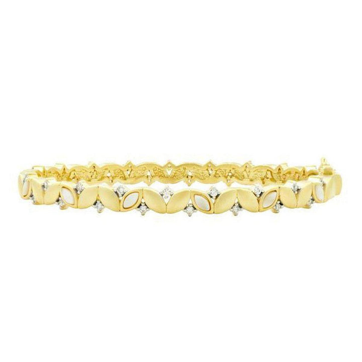 Gold Fleur Bloom bangle with white opal and diamond accents.