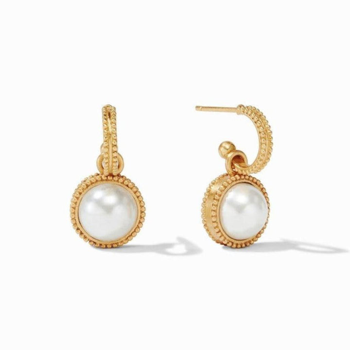 Gold hoop earrings with textured detailing and a dangling pearl charm.