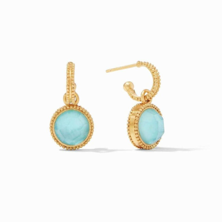 Gold hoop earrings with light blue gemstone accents.