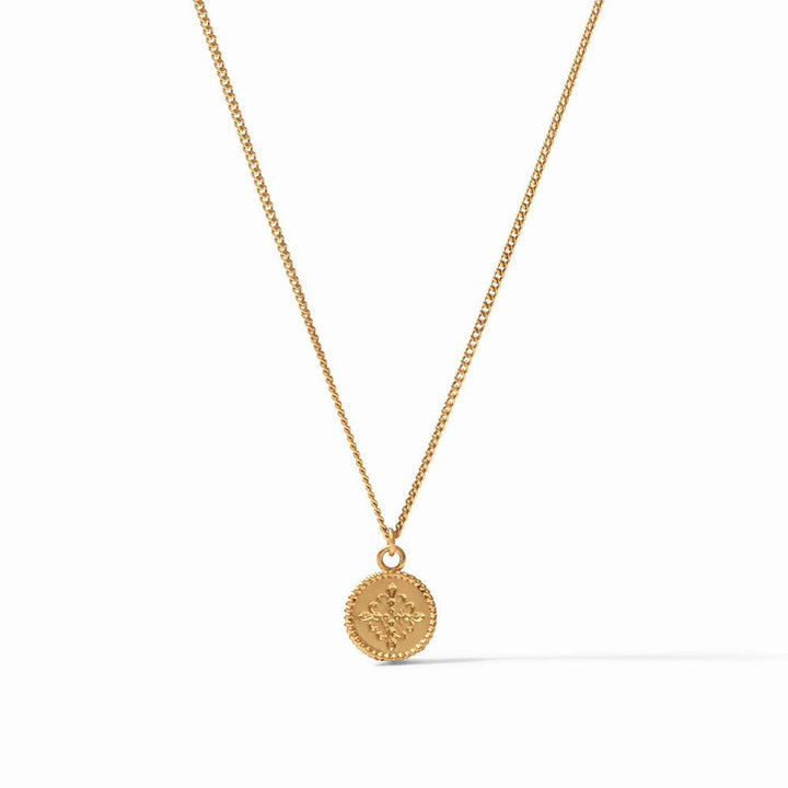 Gold fleur-de-lis pendant necklace on delicate chain.