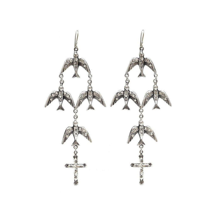 Flock of Aves earrings: Silver tone, crystal-accented birds & cross detail.