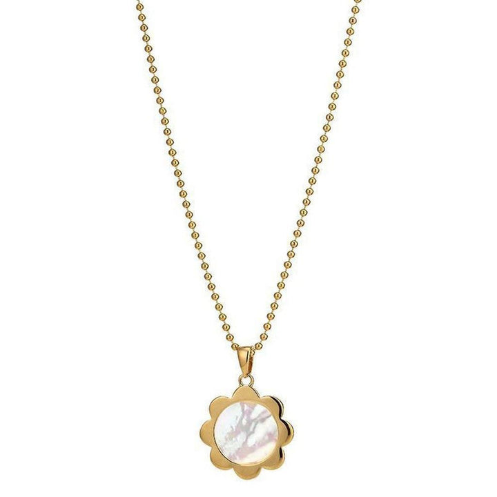 Gold ball chain necklace with a white flower pendant.