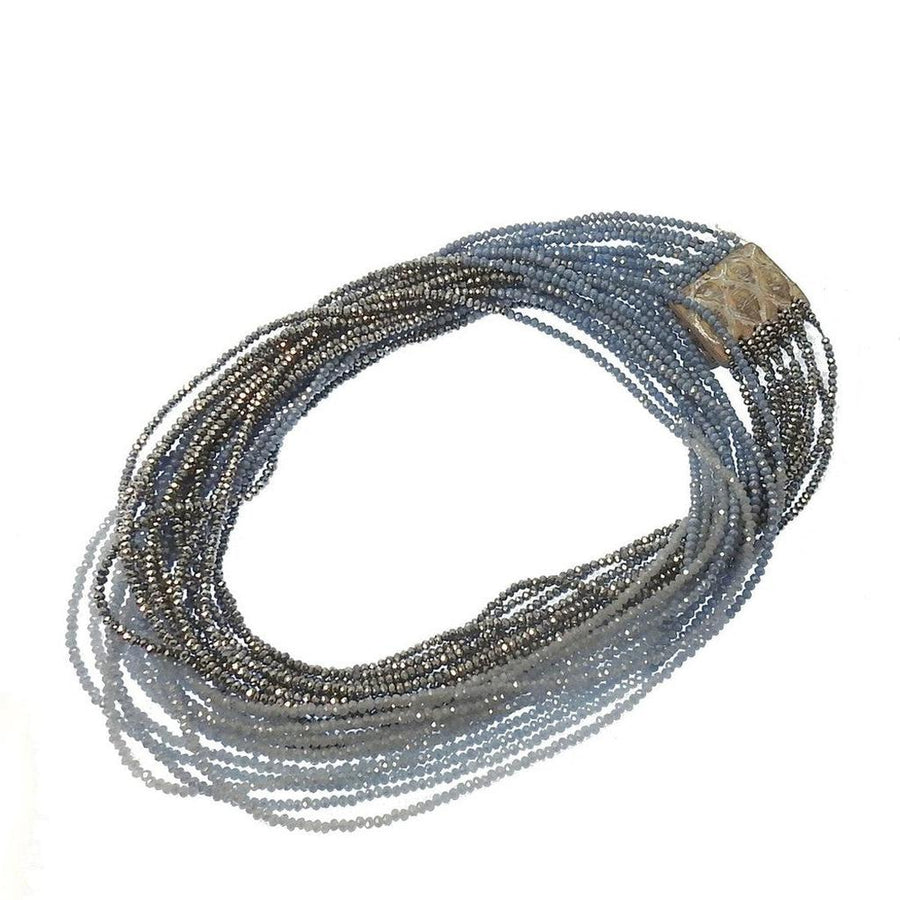 Francesca Necklace: Multi-strand necklace with ombre gray and blue crystal beads and silver clasp.