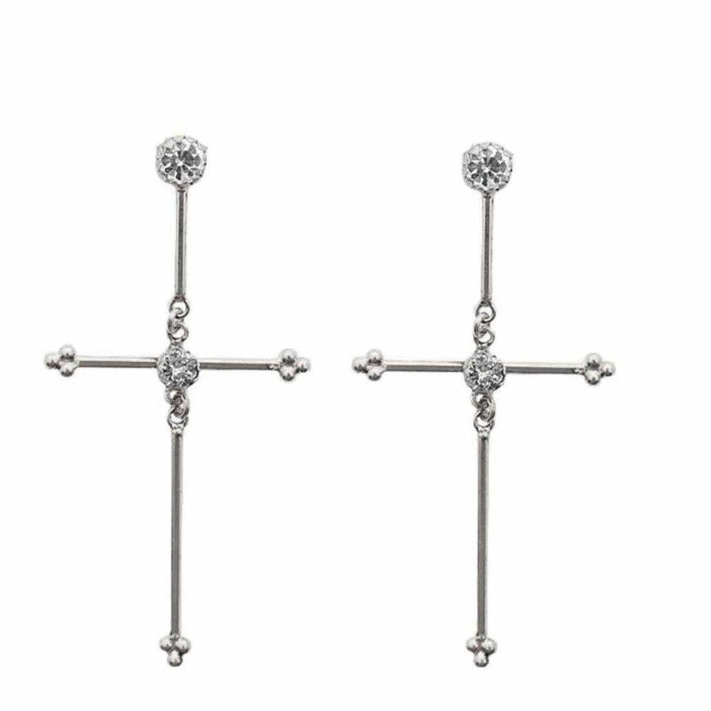Silver cross earrings with sparkling accents.