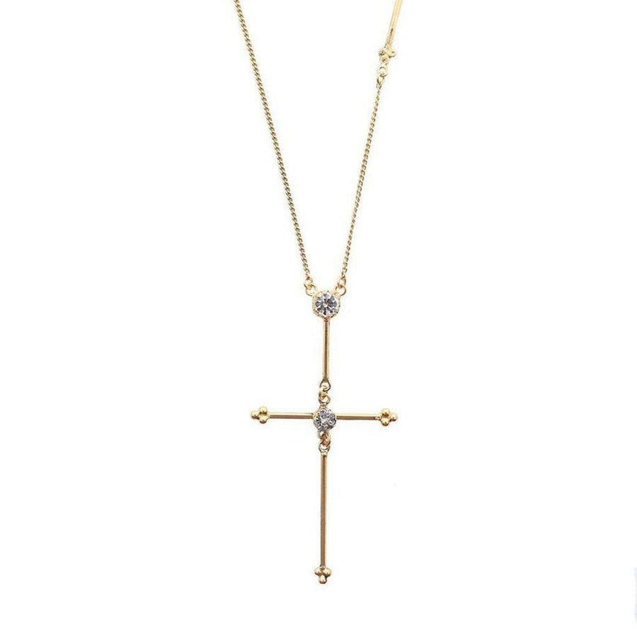 Gold Garland Cross necklace with sparkling cubic zirconia accents.