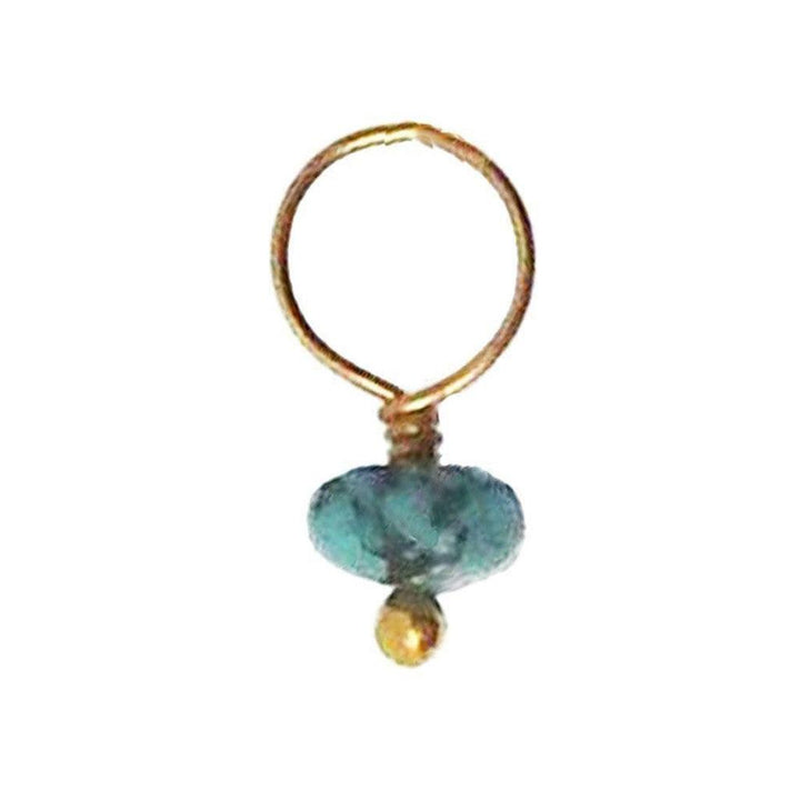 Teal gemstone pendant with gold wire accents.