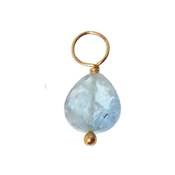 Light blue gemstone charm with gold wire and bead accents.