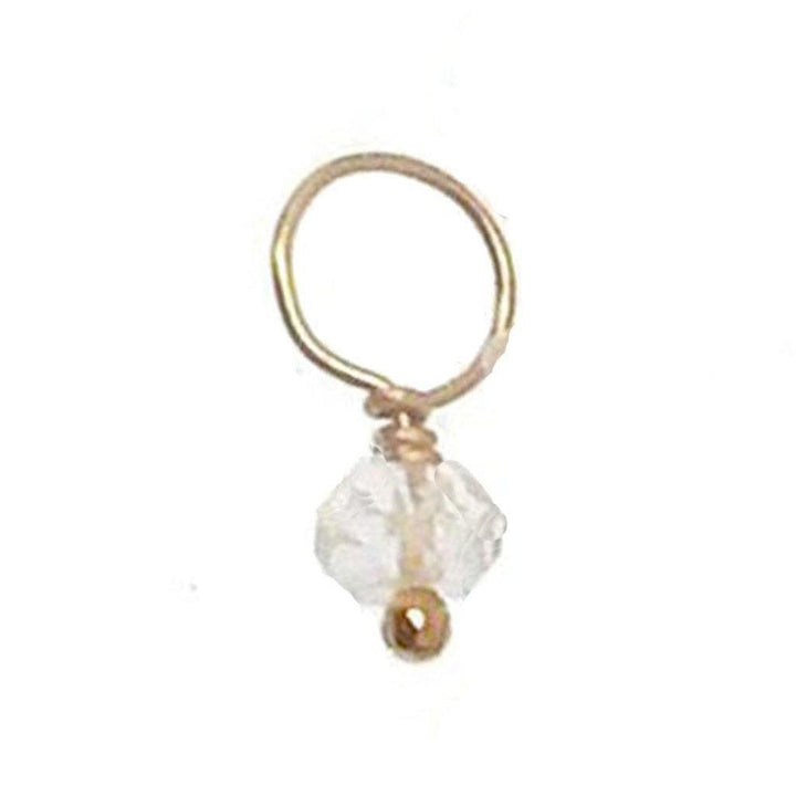 Gold hoop earring with a clear gemstone accent.
