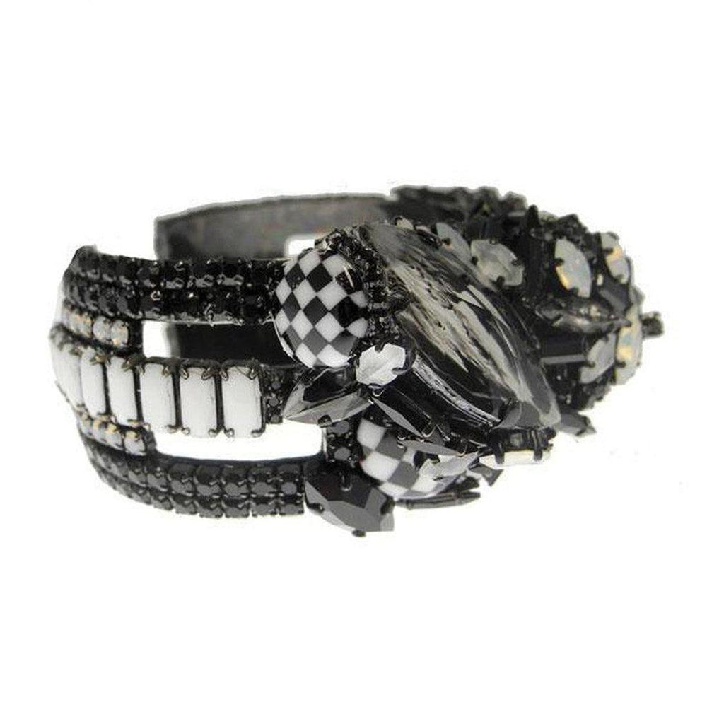 Black and white jeweled cuff bracelet featuring checkerboard and rectangular accents.