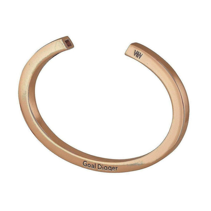 Rose gold cuff bracelet with square cut-out detail.