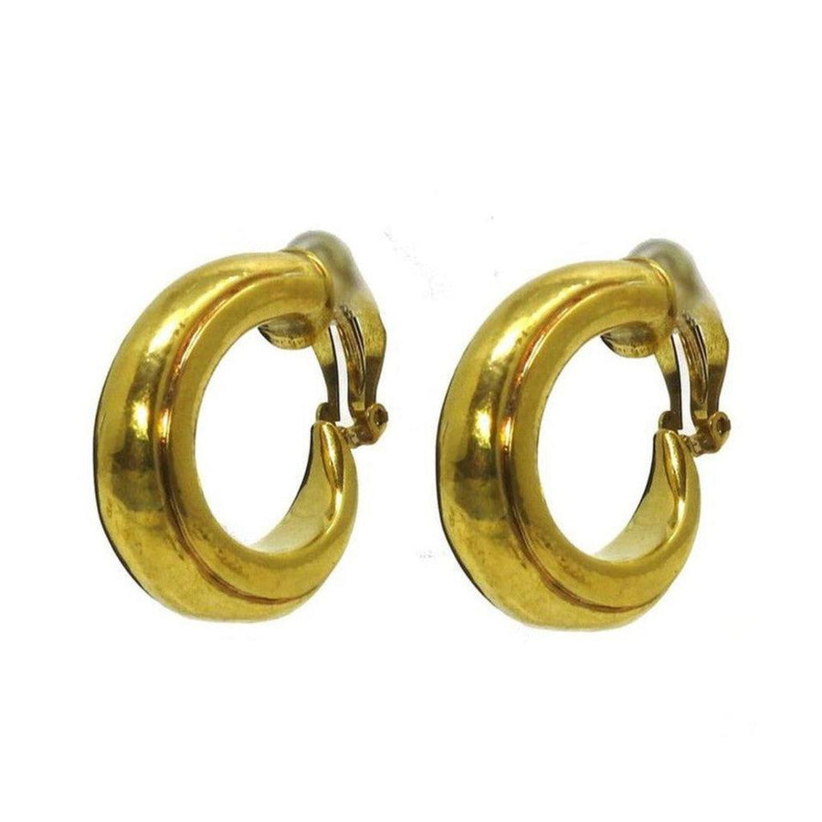 Gold clip-on hoop earrings, classic design.