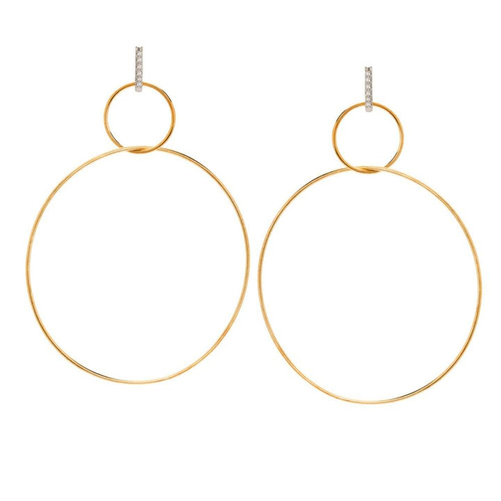 Gold double hoop earrings with diamond accents.