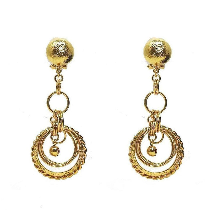 Gold link chandelier clip earrings with textured ball tops and layered circle accents.