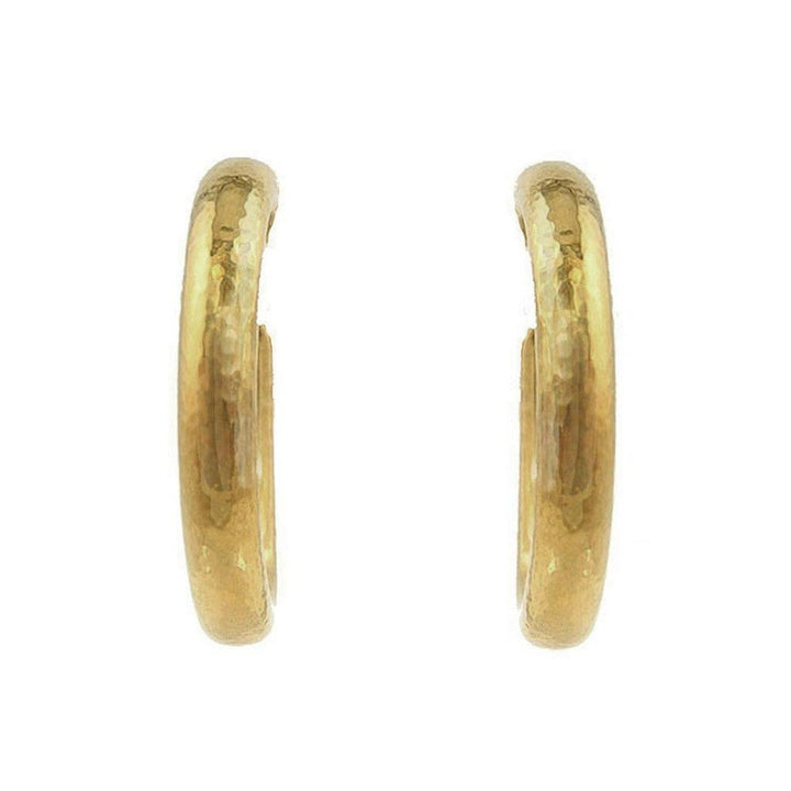 Gold oval hoop earrings with a hammered texture.