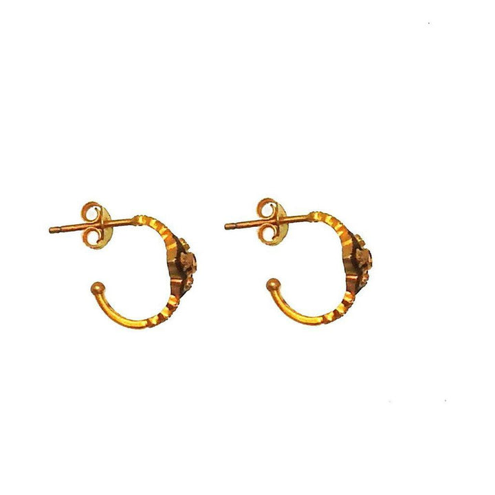 Gold vermeil half-hoop earrings with textured detailing.