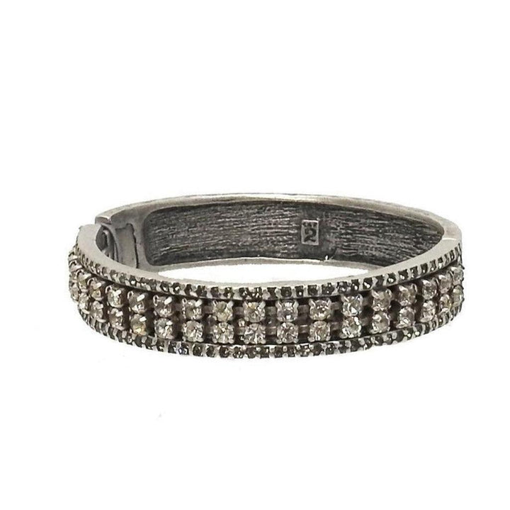 Silver hinged bangle bracelet with crystal detailing.