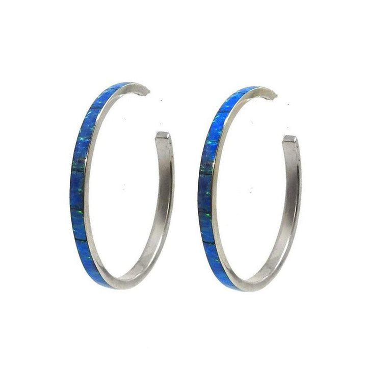 Blue opal hoop earrings with silver settings