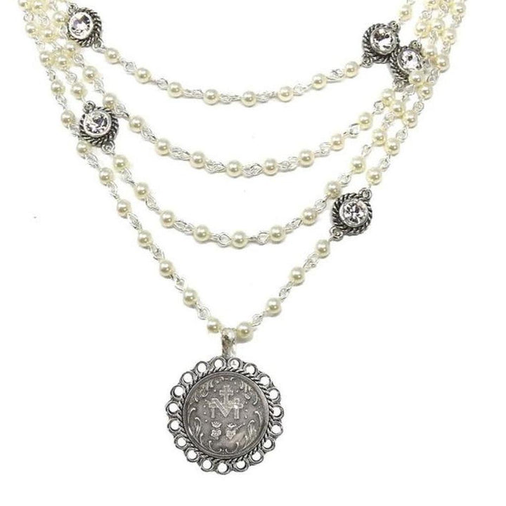 Immaculate Magdalena pearl necklace with silver accents & antique coin pendant.