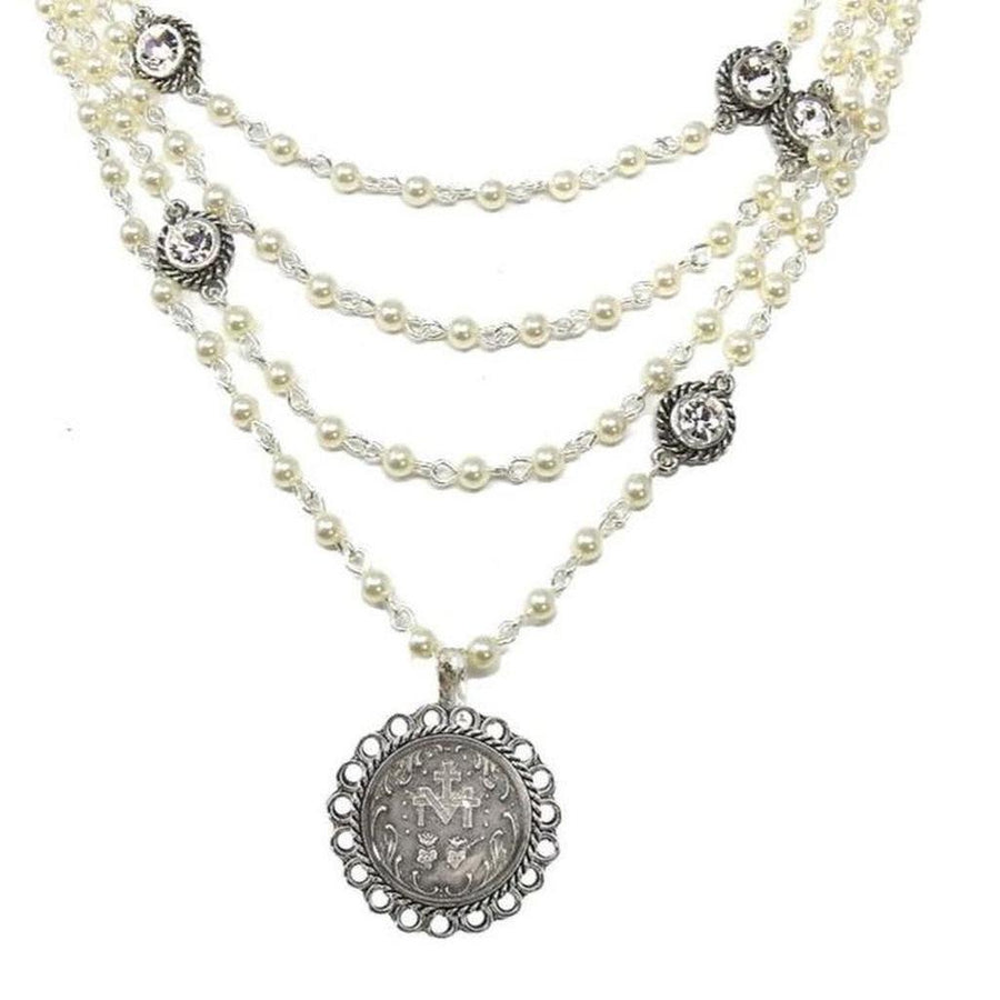 Immaculate Magdalena pearl necklace with silver accents & antique coin pendant.