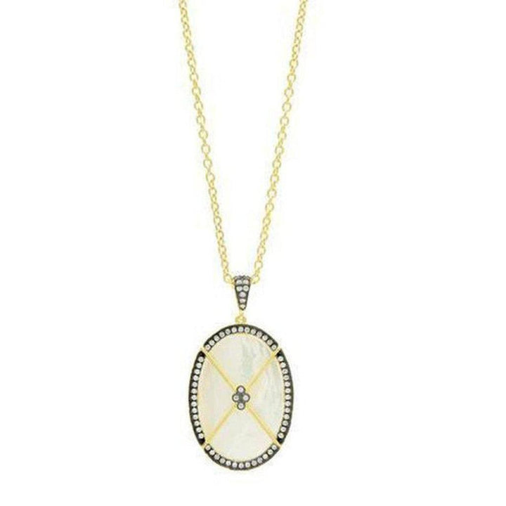 Oval mother-of-pearl pendant necklace with gold chain and black diamond accents.