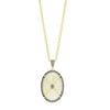 Oval mother-of-pearl pendant necklace with gold chain and black diamond accents.