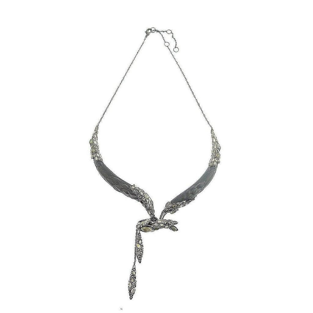 Elegant dark gray snake-form necklace with shimmering gemstone accents.