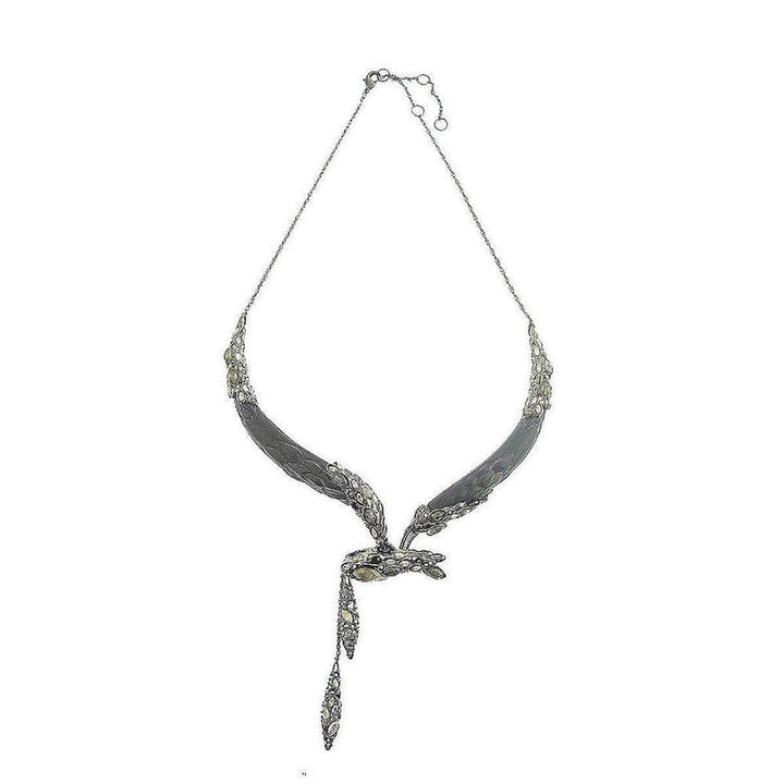 Elegant dark gray snake-form necklace with shimmering gemstone accents.