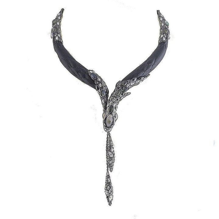 Imperial Snake necklace: Black leather, silver-tone metal, gemstone accents.