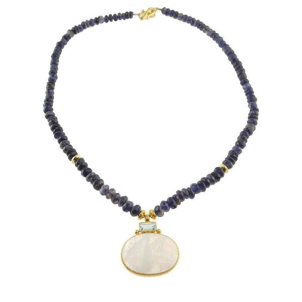 Elegant necklace featuring iolite beads and a moonstone pendant accented with blue topaz.