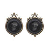 Jet Round Intaglio clip earrings with antique brass finish and pearl accents.