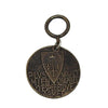 Joan of Arc medallion, bronze, featuring shield and Latin inscription.