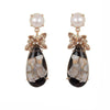 Joya Honey Drop Earrings: Rose gold earrings featuring teardrop black & white stones, pearls, and topaz accents.