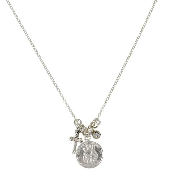 Silver chain necklace featuring a St. Christopher medal, small cross, and crystal charm.