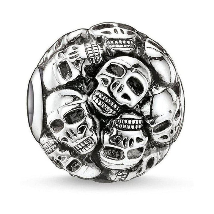 Silver Karma Bead Skulls charm featuring multiple detailed skull designs.
