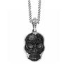 Large Carved Jet Baroque Skull Pendant necklace, black stone skull with ornate silver chain.