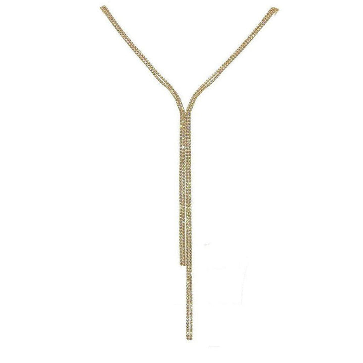 Gold lariat necklace with crystal accents, dangling design.