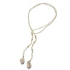Elegant lariat necklace featuring baroque pearls and crystal beads; perfect for adding a touch of sophistication to any outfit.