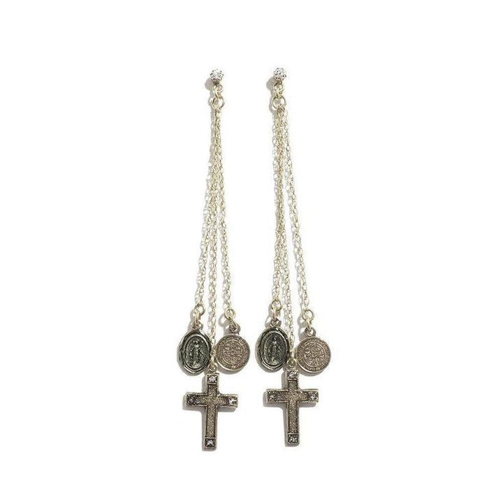 Gold chain earrings featuring cross and medal charms.