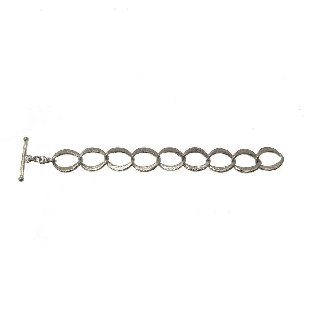 Silver link bracelet with hammered texture, T-bar clasp.