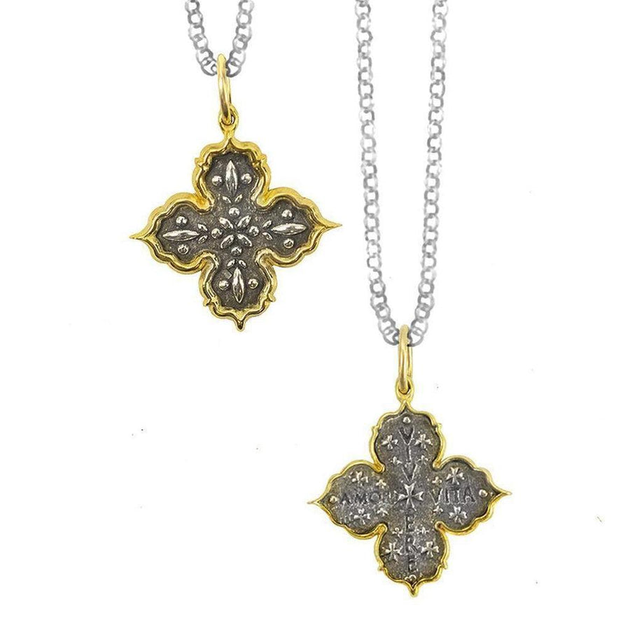Live, Love, Life Charm Necklace: Two-tone silver and gold cross pendant with intricate detailing on a delicate chain.