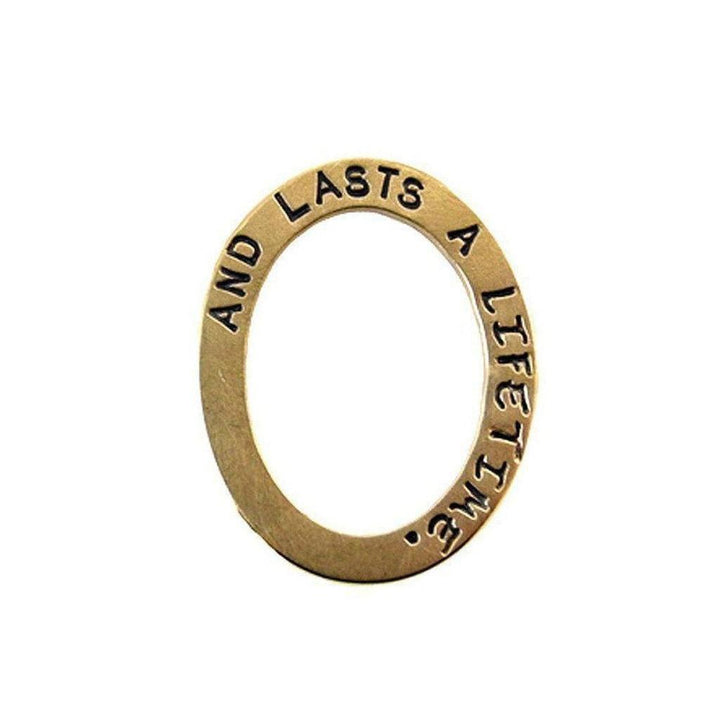 Gold oval pendant inscribed "And lasts a lifetime."