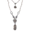 Love Heals Audrey necklace: Silver filigree, heart charm, & white stone beads.