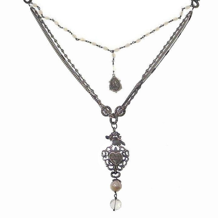 Love Heals Valeria necklace: layered chain, pearl accents, heart charm, antique silver finish.