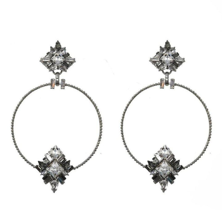 Lucy in the Sky crystal and silver hoop earrings with unique geometric design.