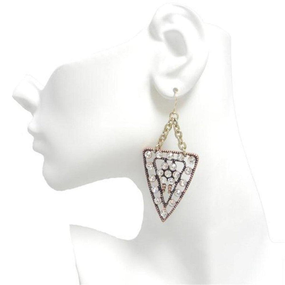 Crystal-studded triangular earrings with antique gold chain; displayed on mannequin.