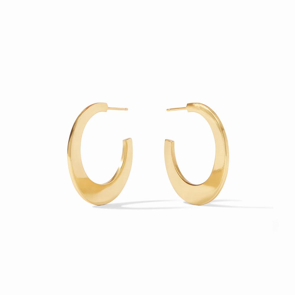 Gold-toned metal hoop earrings, modern minimalist design.