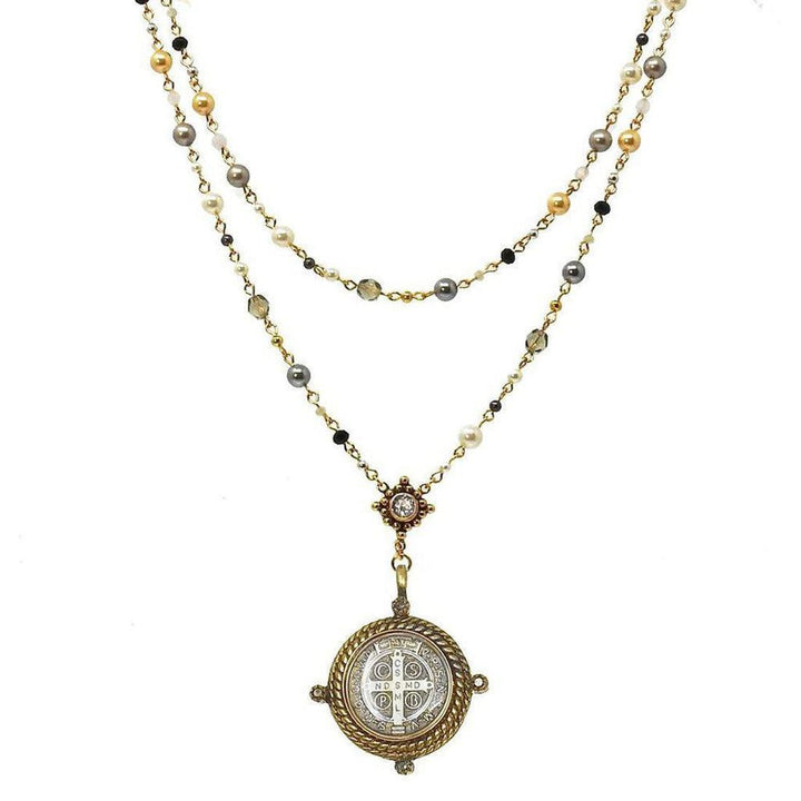 Elegant double-strand pearl rosary necklace with a detailed medallion pendant.