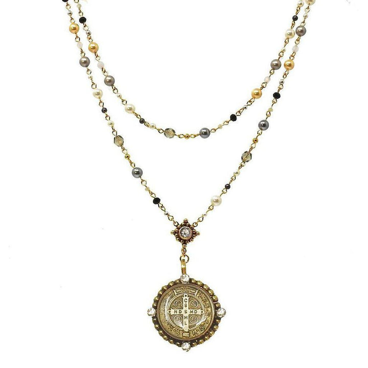 Double-strand pearl and gemstone rosary necklace with antique-style medallion pendant.