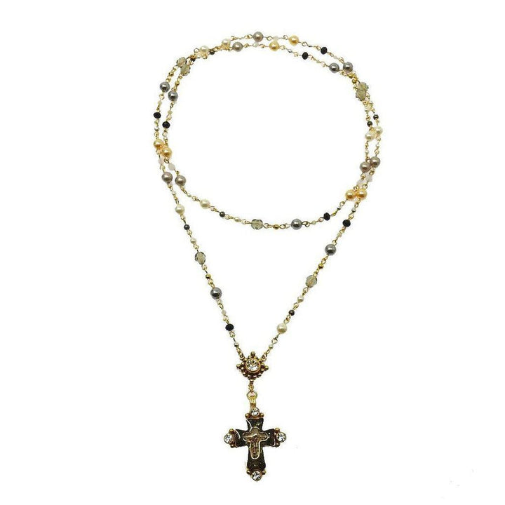 Elegant double-strand pearl and crystal rosary necklace with ornate cross pendant.