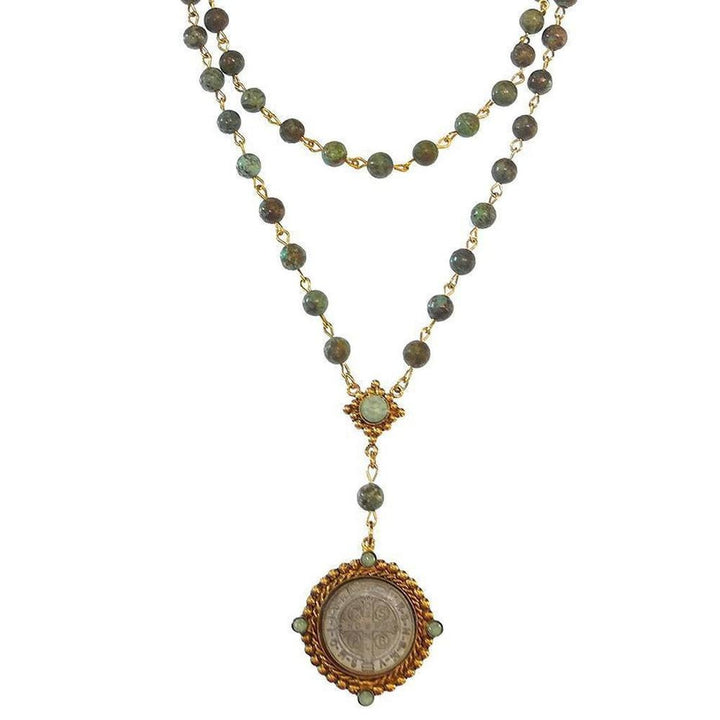Lux Turquoise Rosary: Double-strand necklace with green turquoise beads and gold accents, featuring a St. Christopher medal.